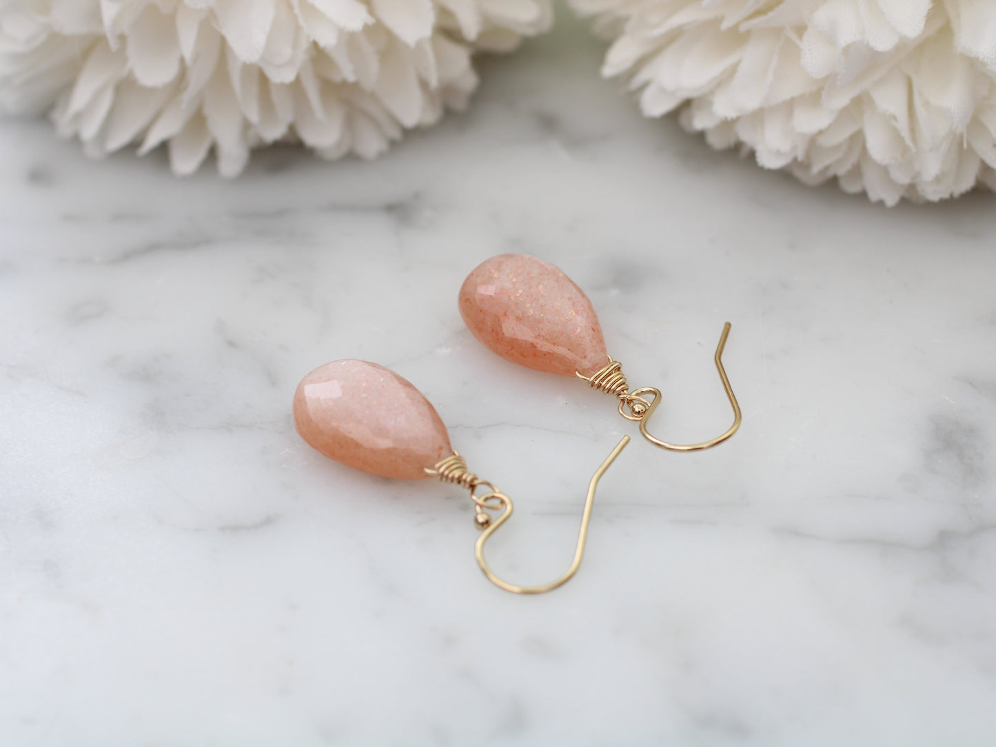 Peach moonstone drop earrings.