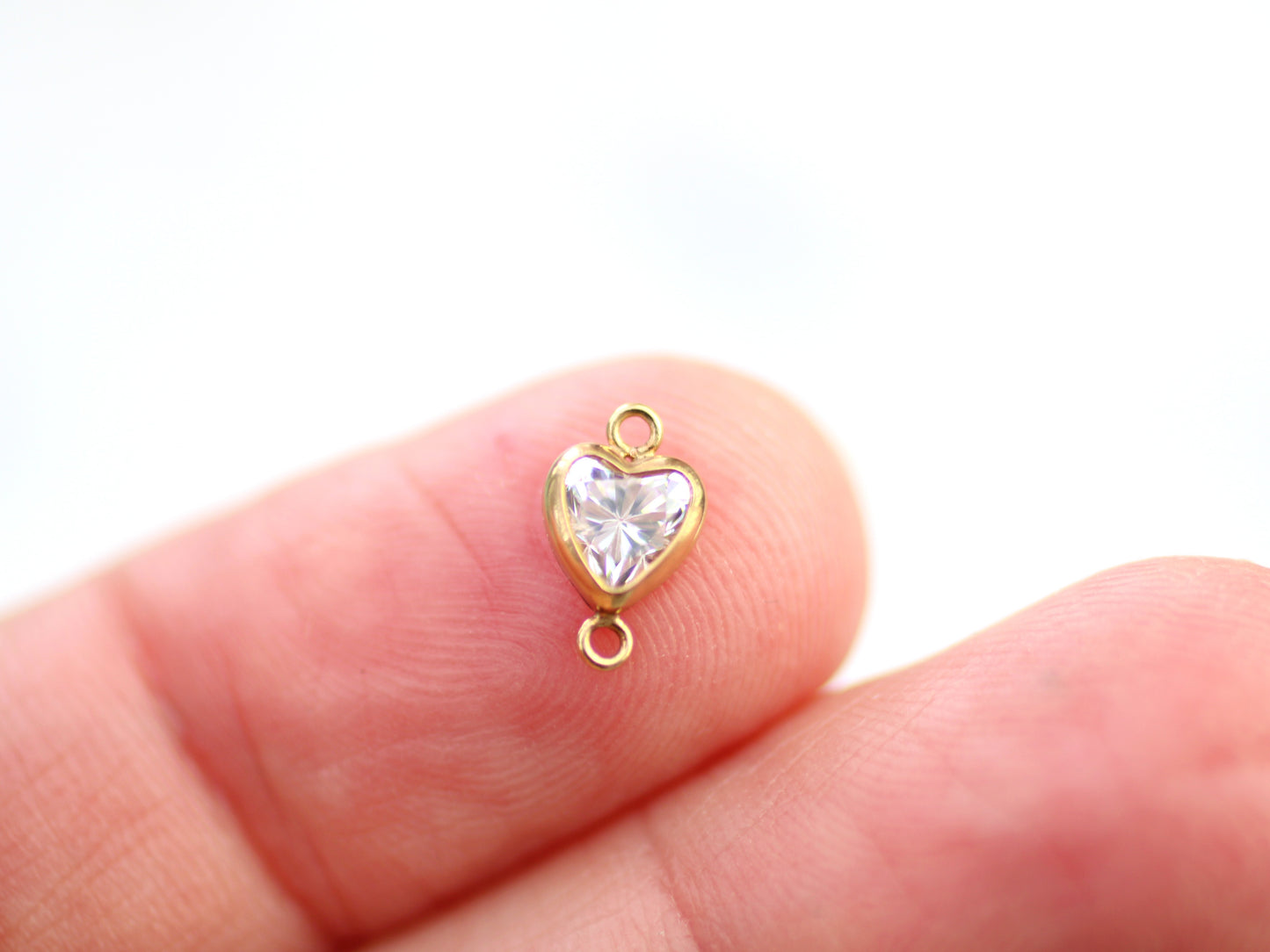 Gold filled 5 mm crystal heart connector.