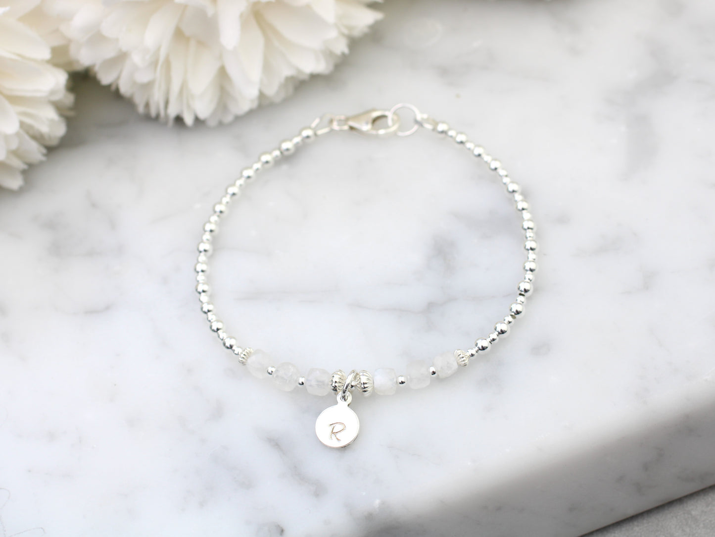 Rainbow moonstone initial bracelet.