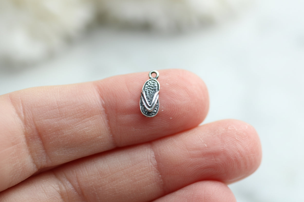 Flip-flop charm.