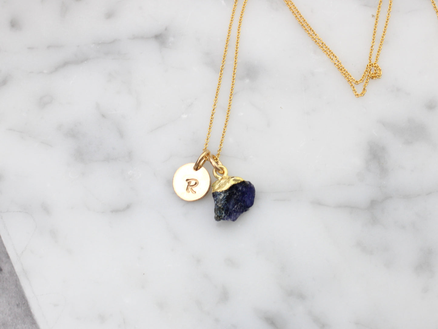Personalised sapphire necklace in gold.