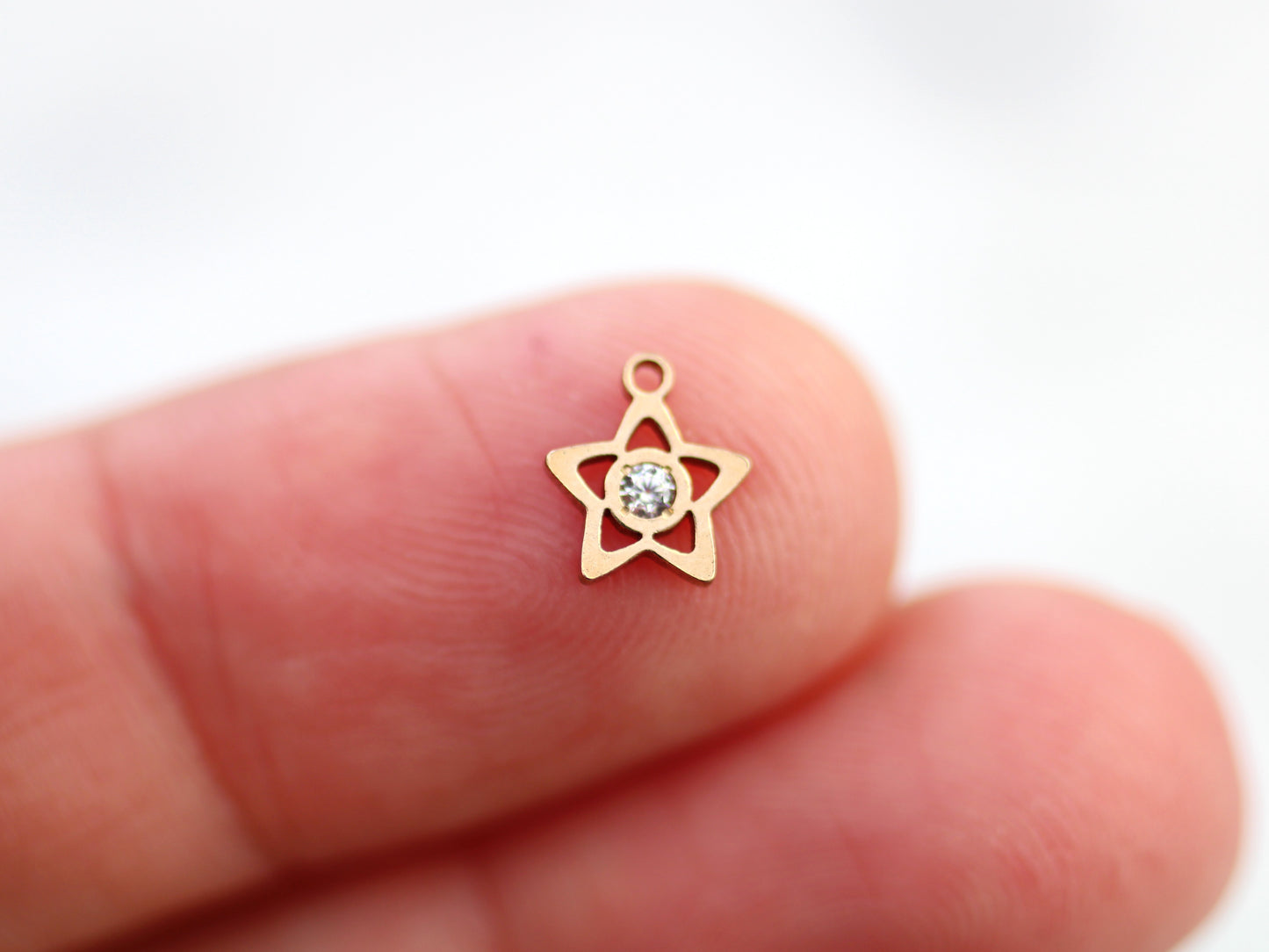 Gold filled star charm.