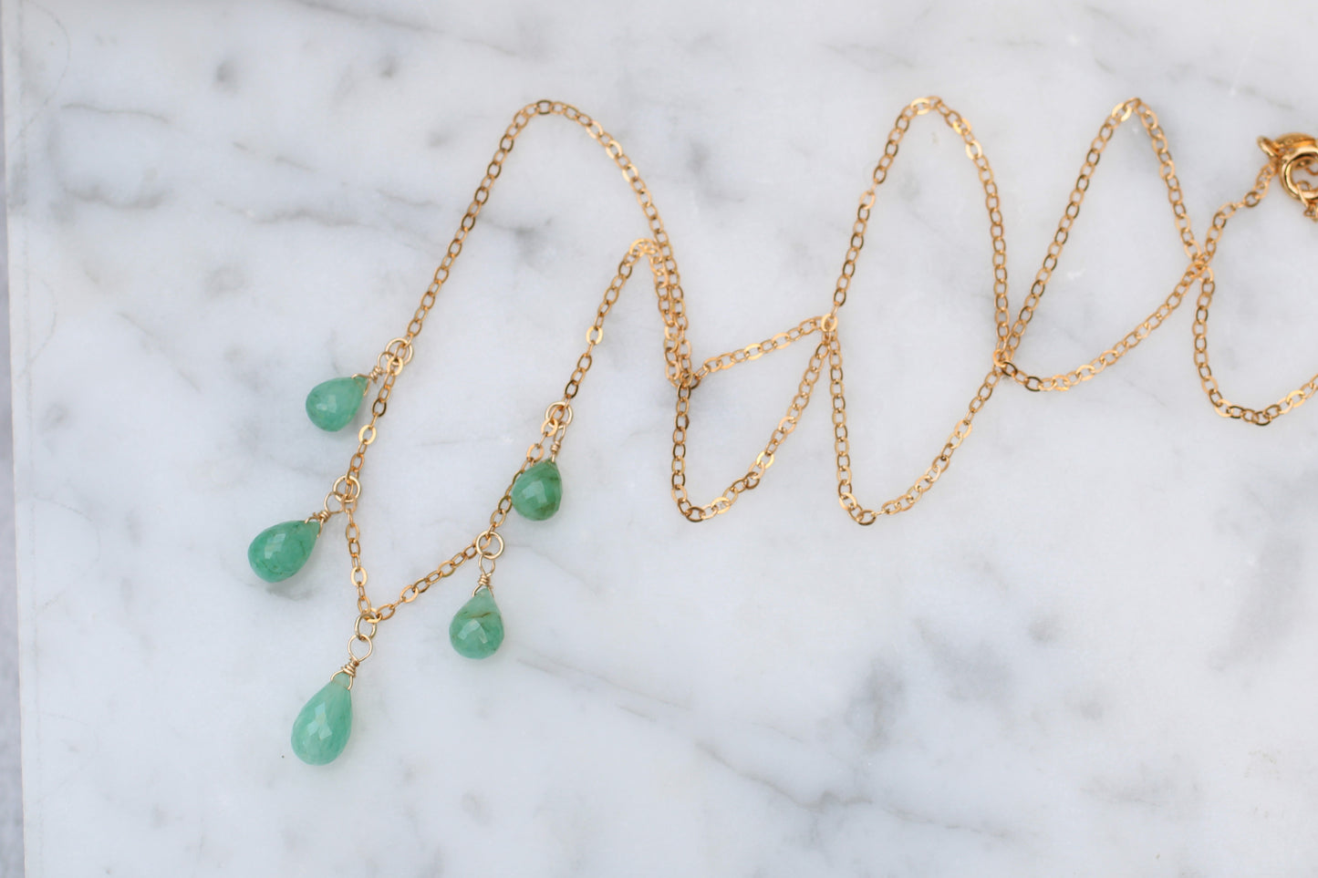 Wire-Wrapped Emerald Briolette Necklace in Gold.