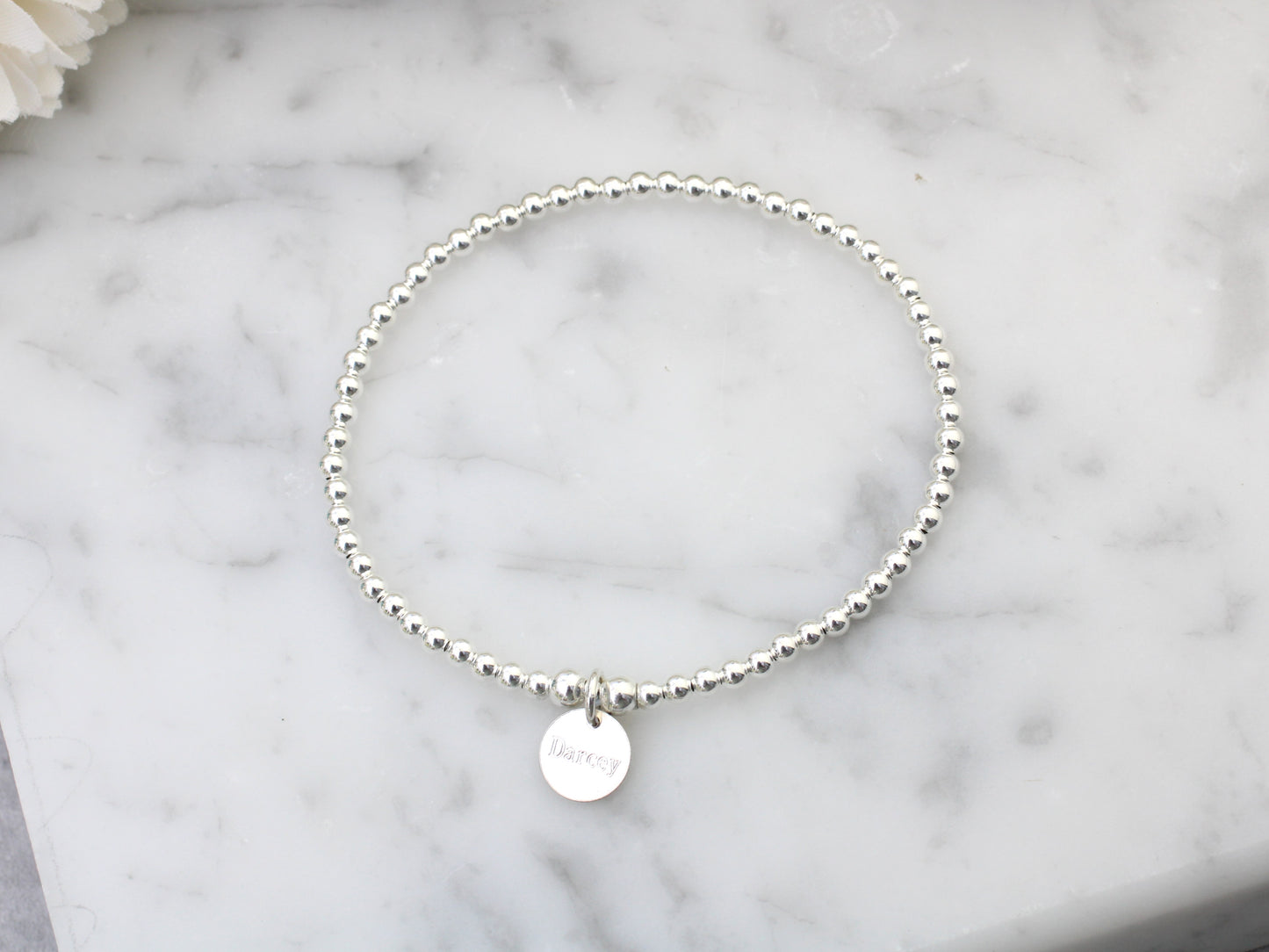 Personalised bead bracelet.