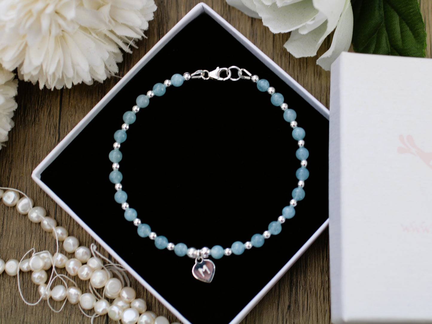 Aquamarine initial bracelet. March birthstone bracelet.