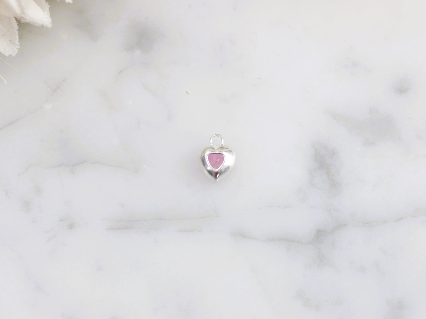 Heart birthstone charm.