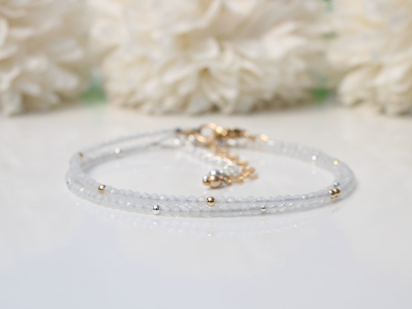 Skinny moonstone bracelet in silver or gold.