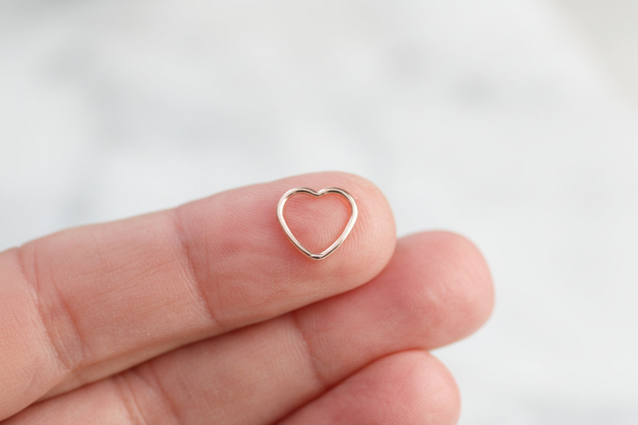 Rose gold heart connector.