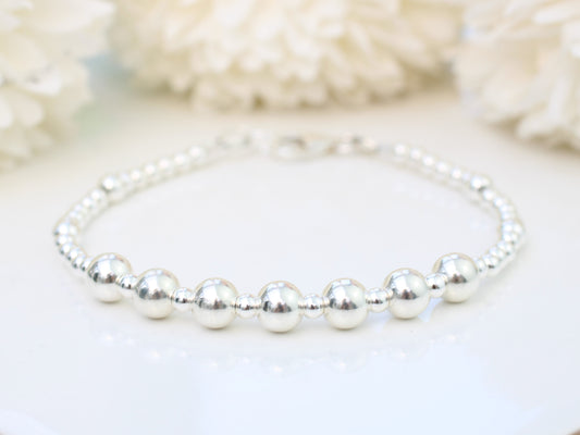 70th birthday bracelet. 70th birthday gift. Sterling silver bead bracelet.