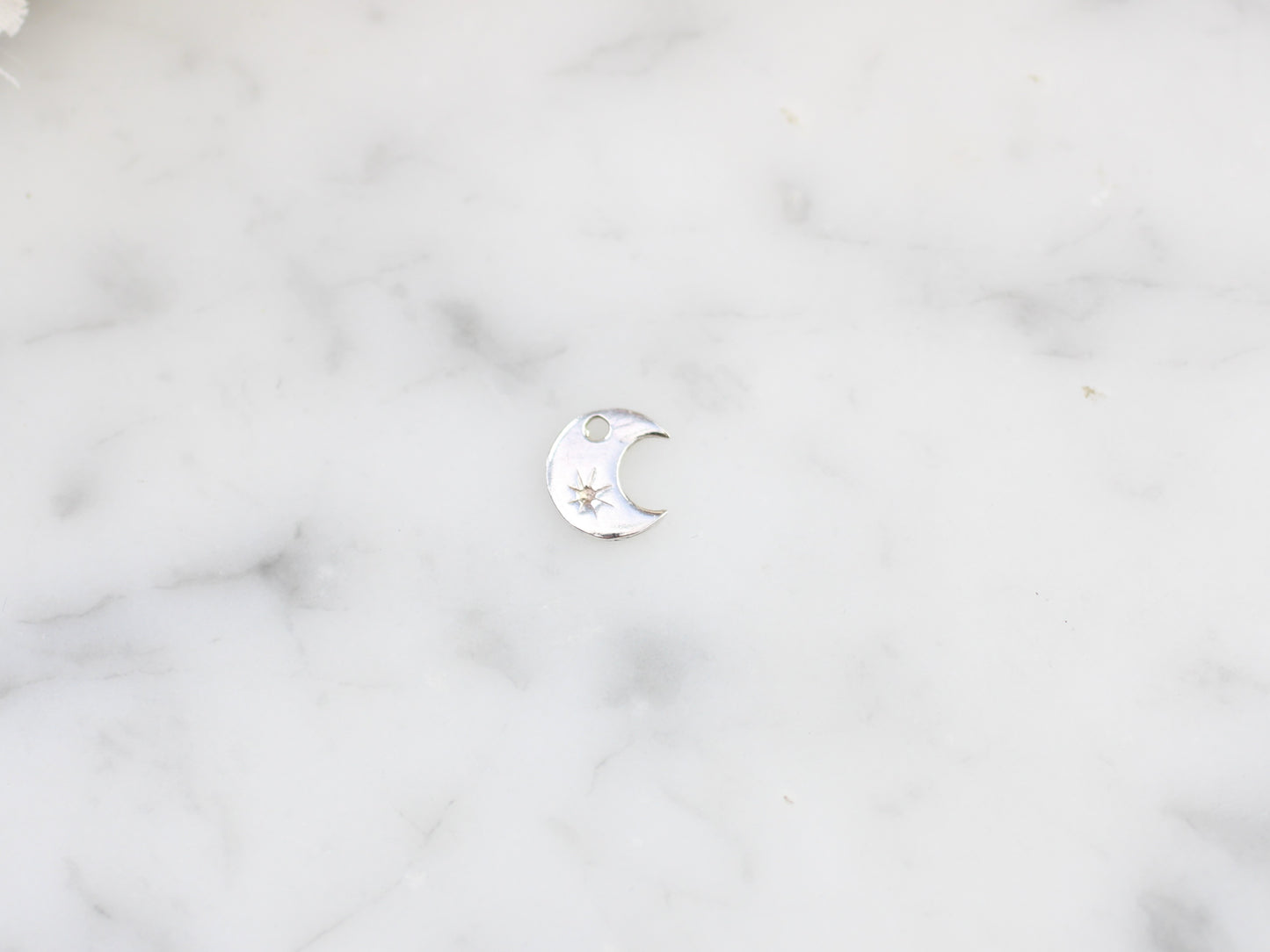 Moon charm.