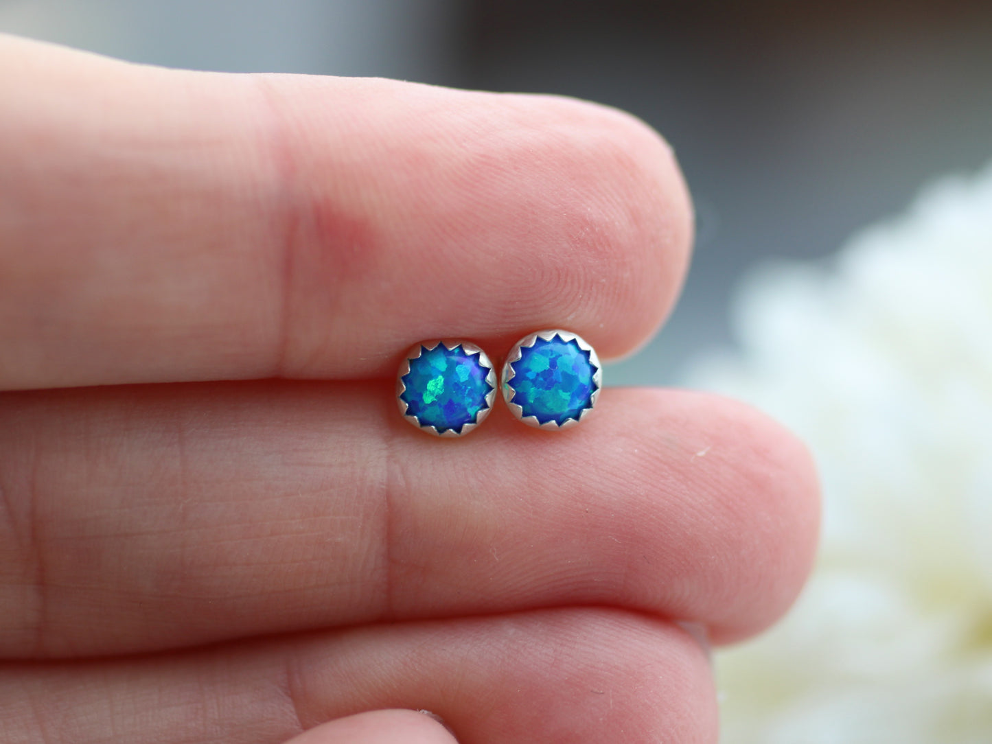 Blue opal stud earrings.
