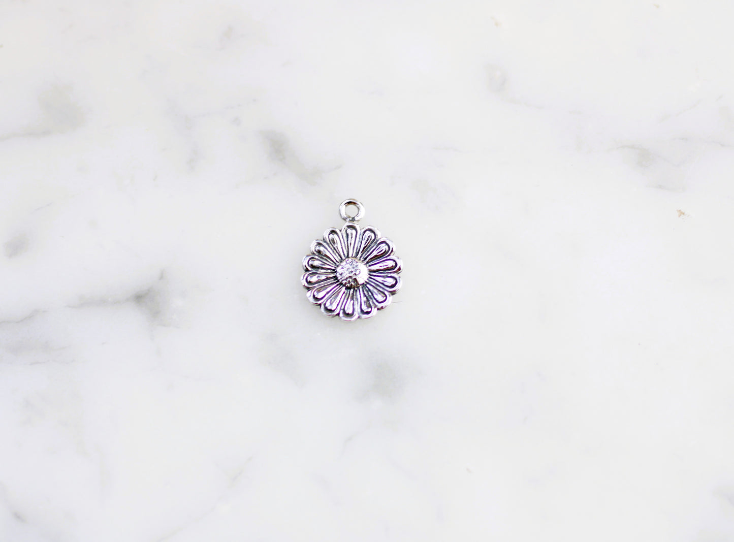Daisy charm.