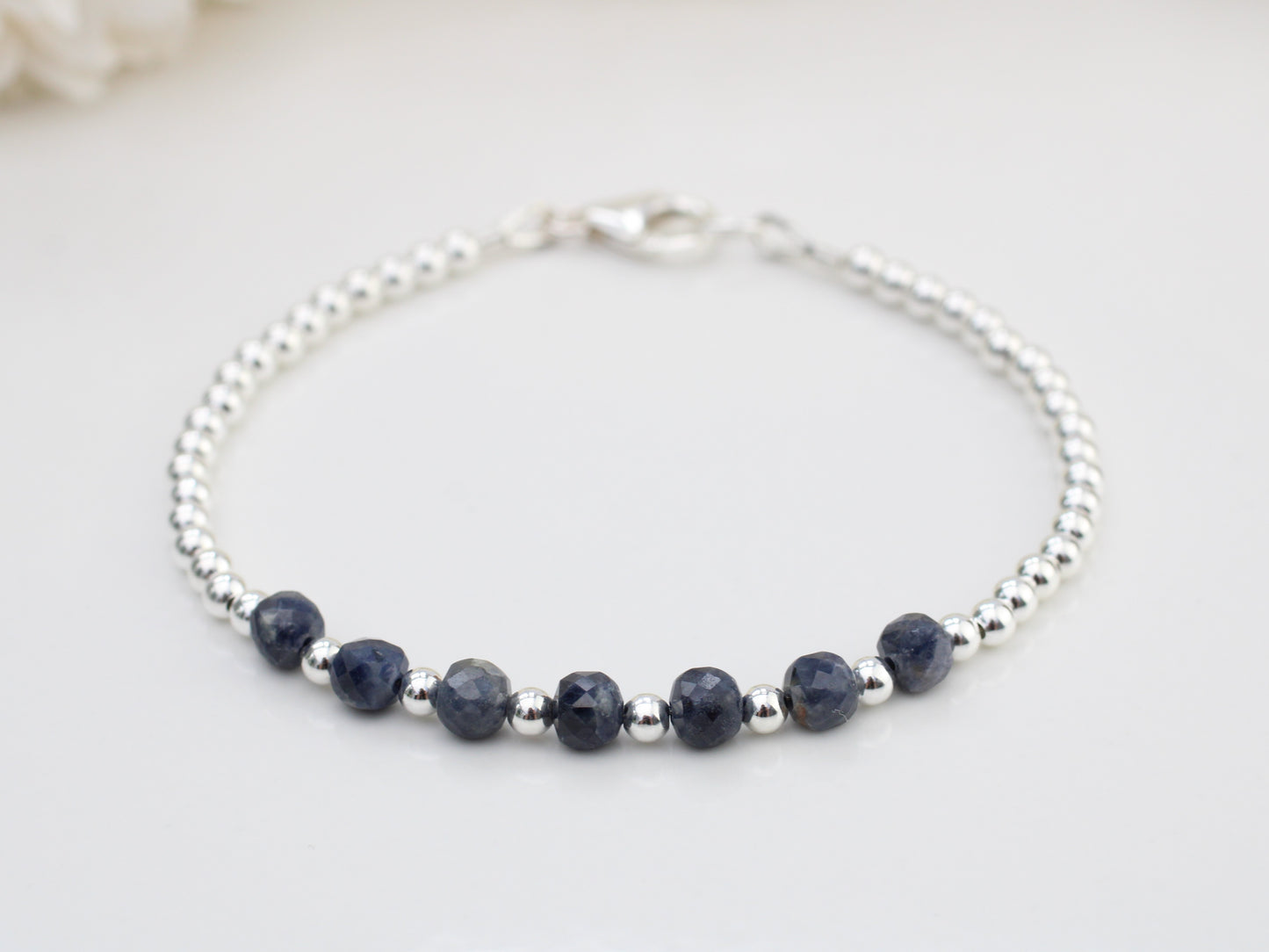 Sapphire milestone bracelet in sterling silver.