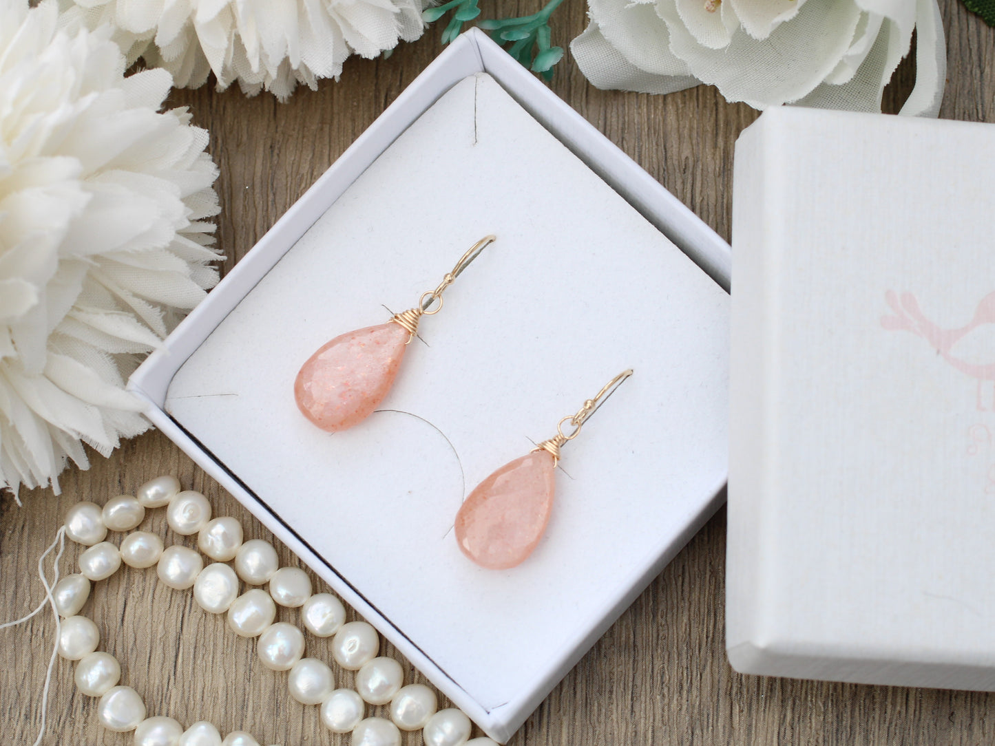 Peach moonstone drop earrings.