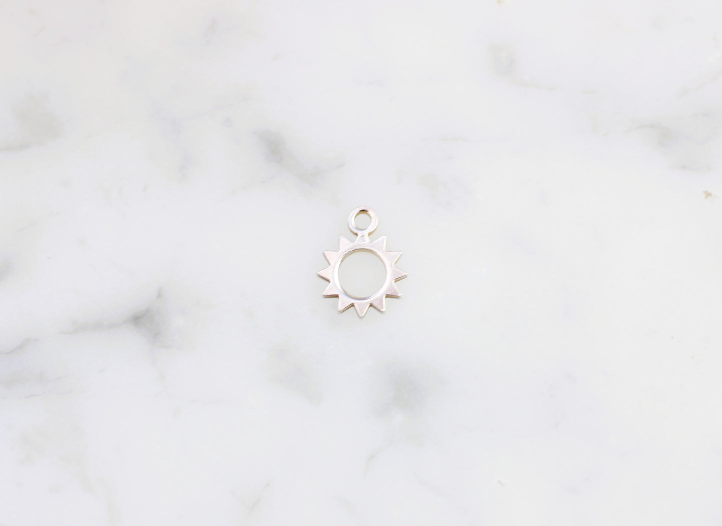Sun charm.