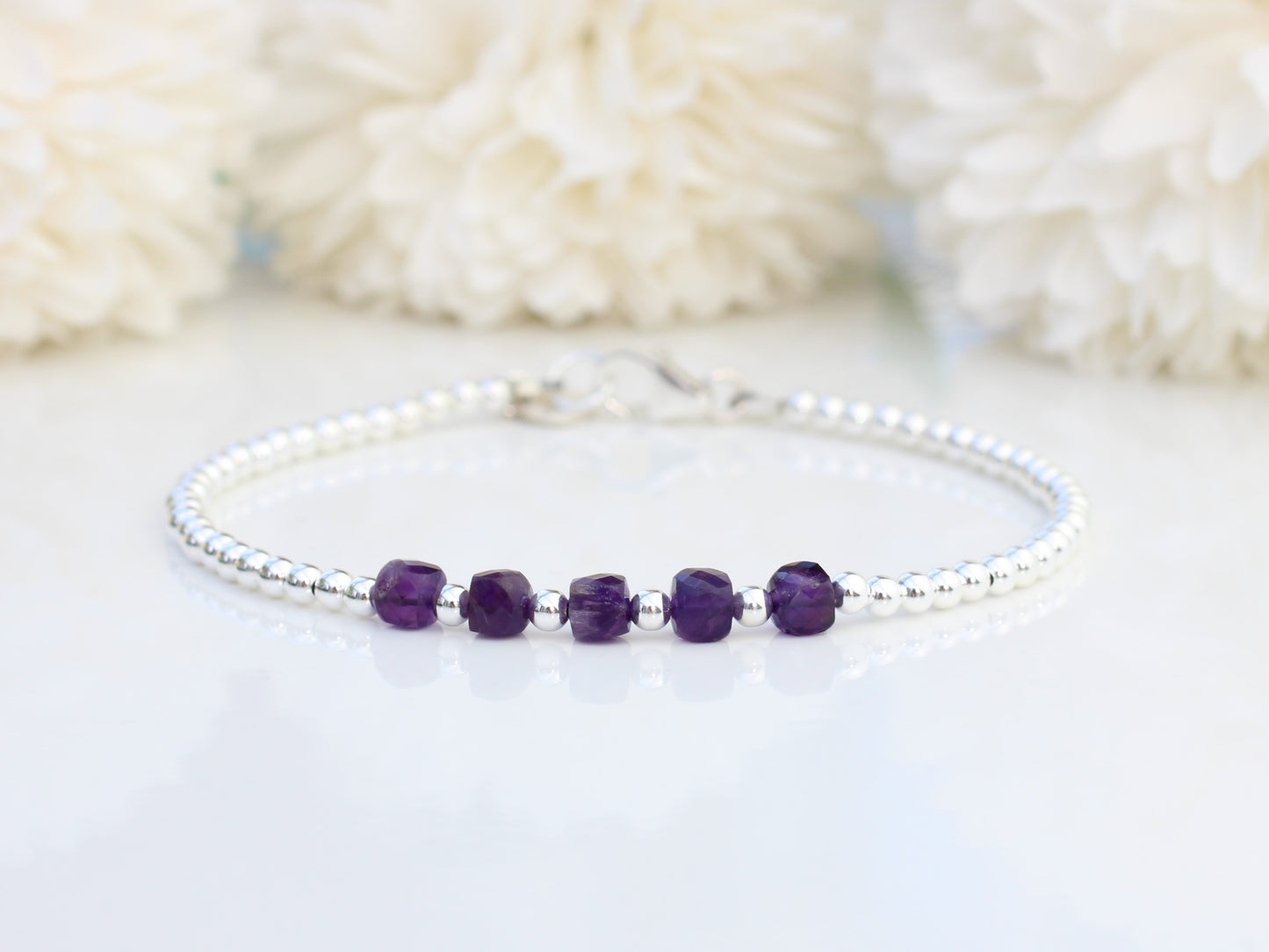 Amethyst milestone bracelet in sterling silver.