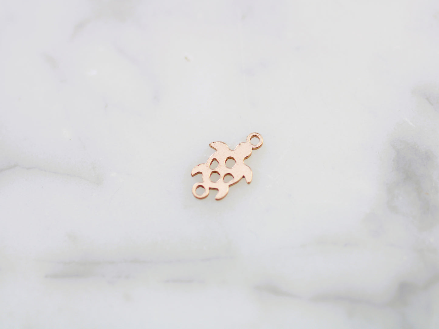 Gold filled turtle connector.