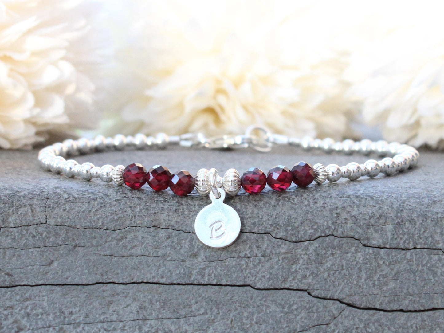 Initial and birthstone bracelet.