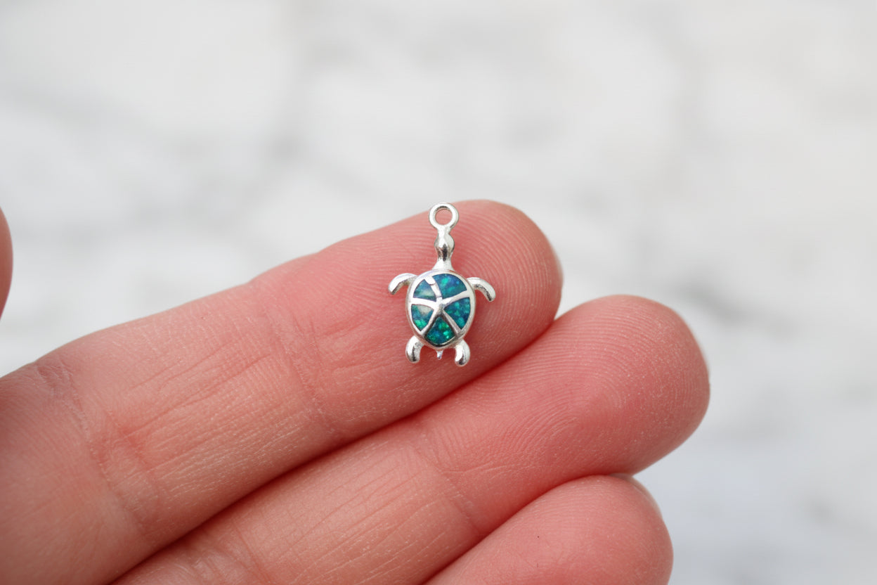 Blue opal turtle charm.