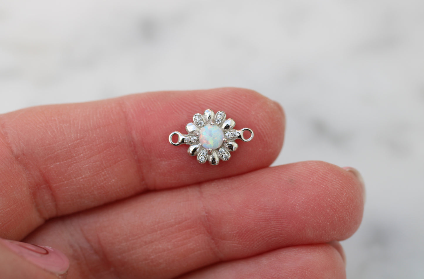 Opal flower connector.