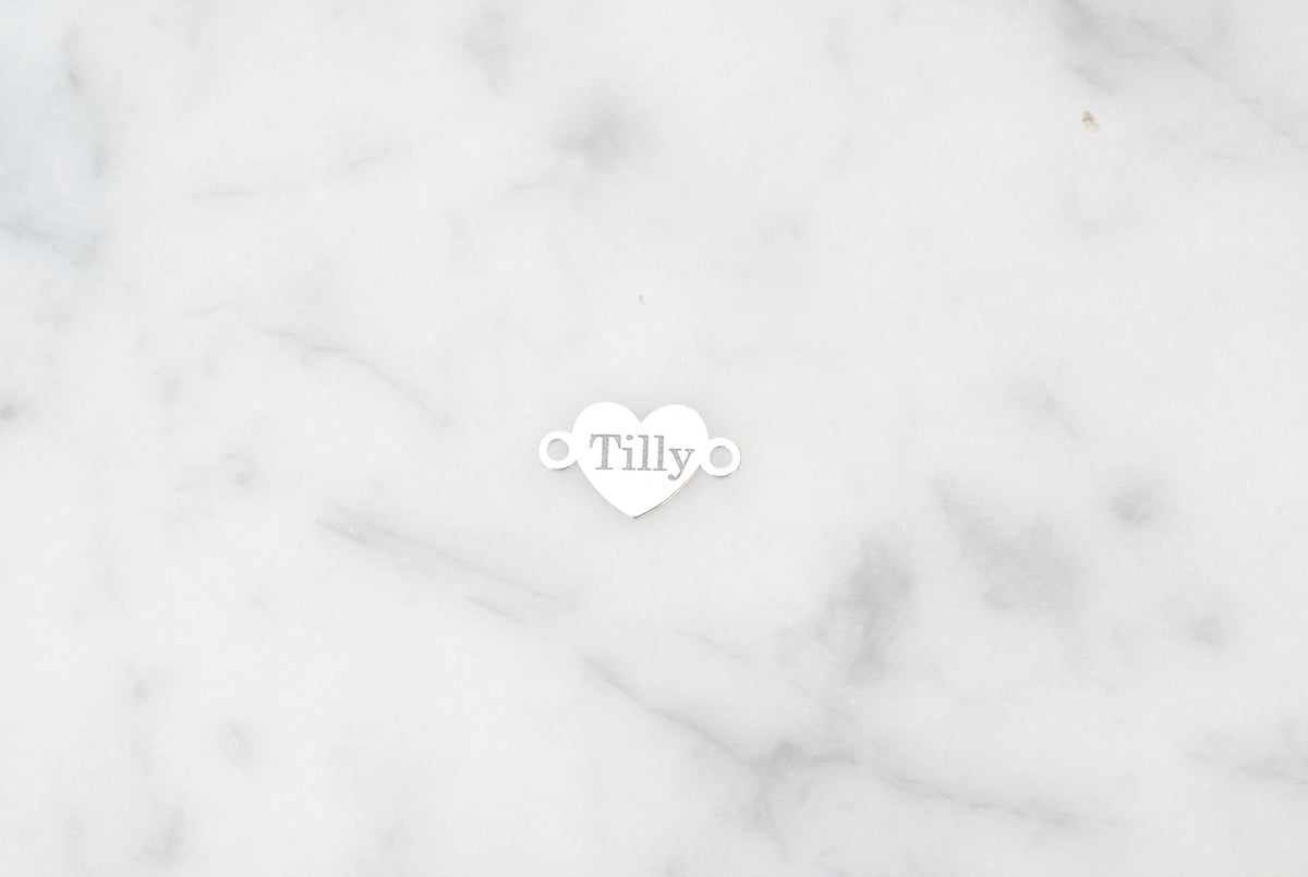 Engraved heart connector.