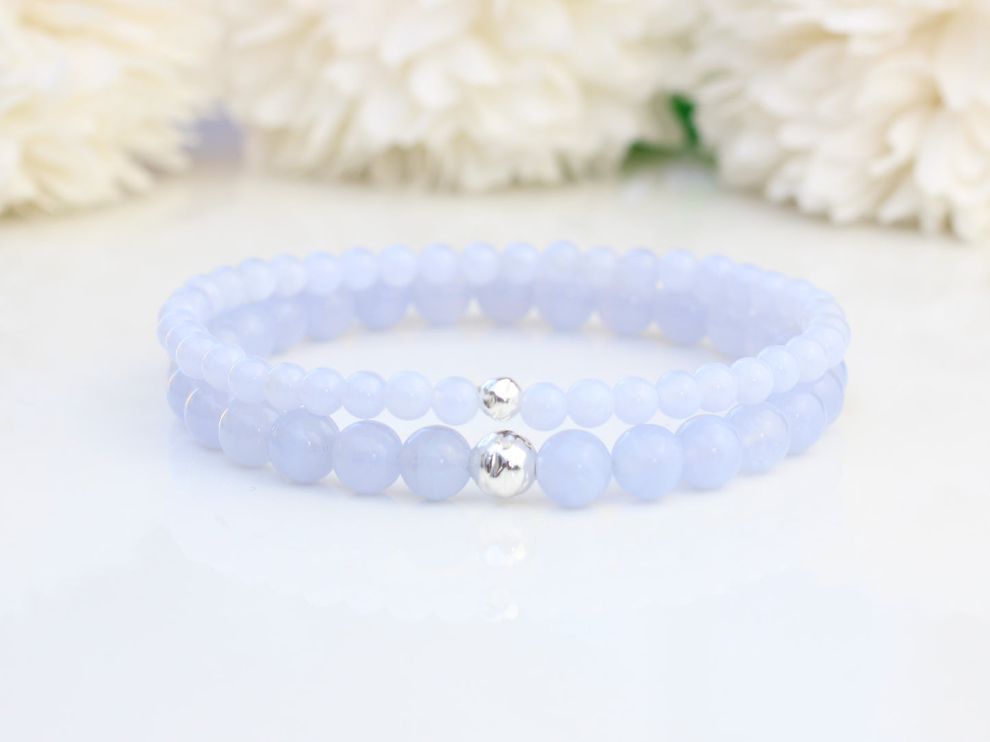 Blue lace agate stretch bracelet with sterling silver accent bead.