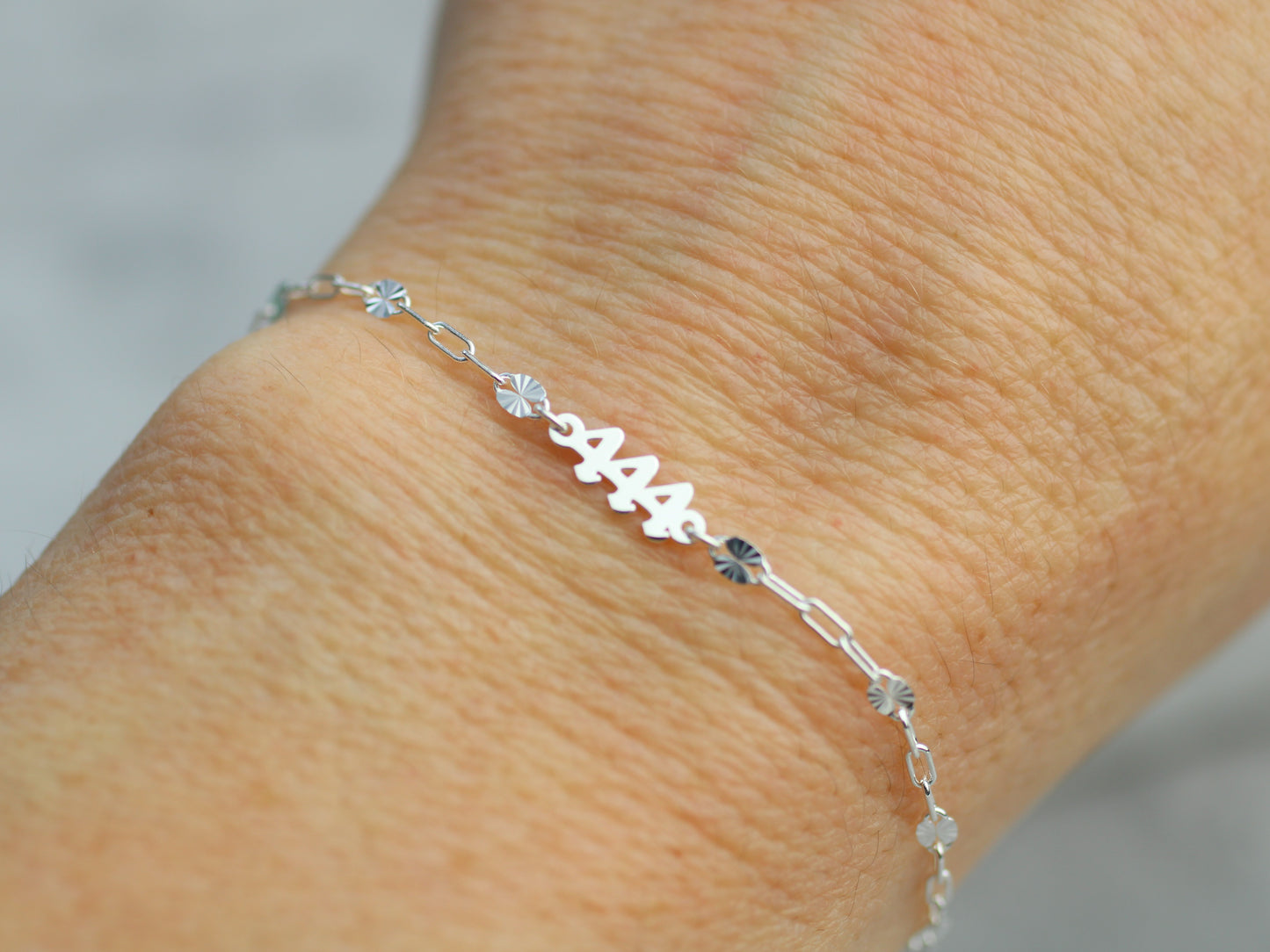 Angel number bracelet in sterling silver.