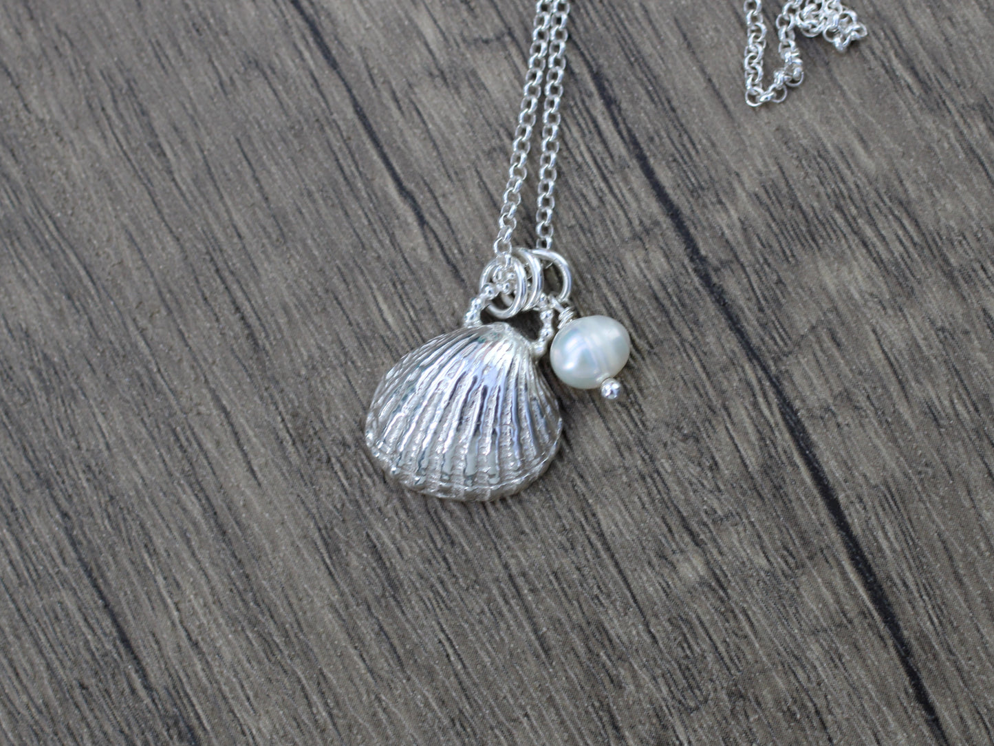Seashell pendant necklace with optional freshwater pearl.