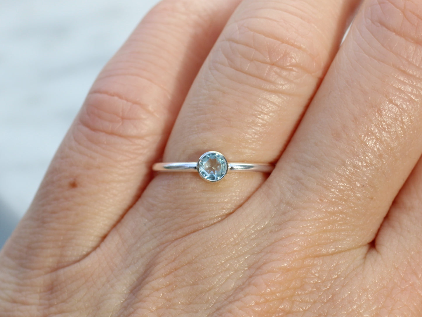 Blue topaz ring in silver. November birthstone ring.