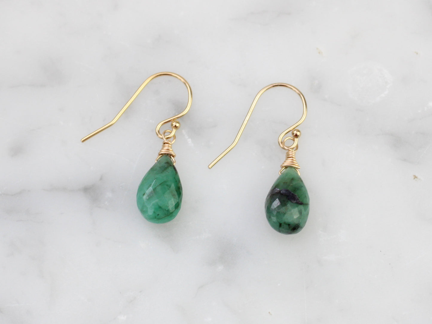 May birthstone earrings.