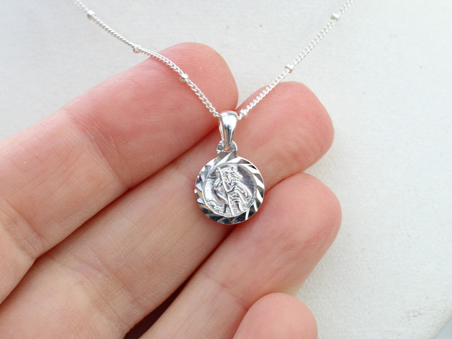 Saint Christopher necklace in silver.