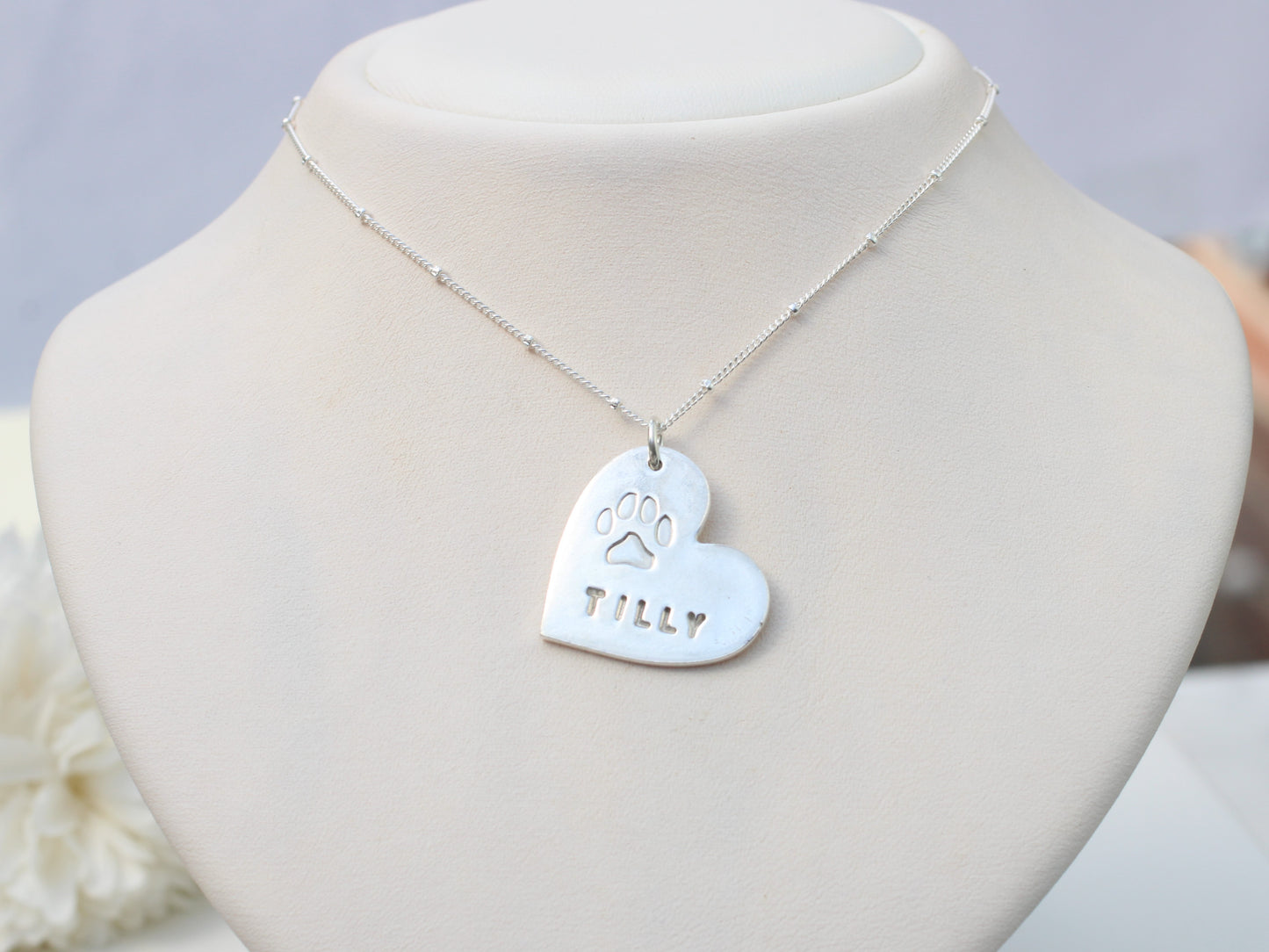 Personalised paw print necklace.