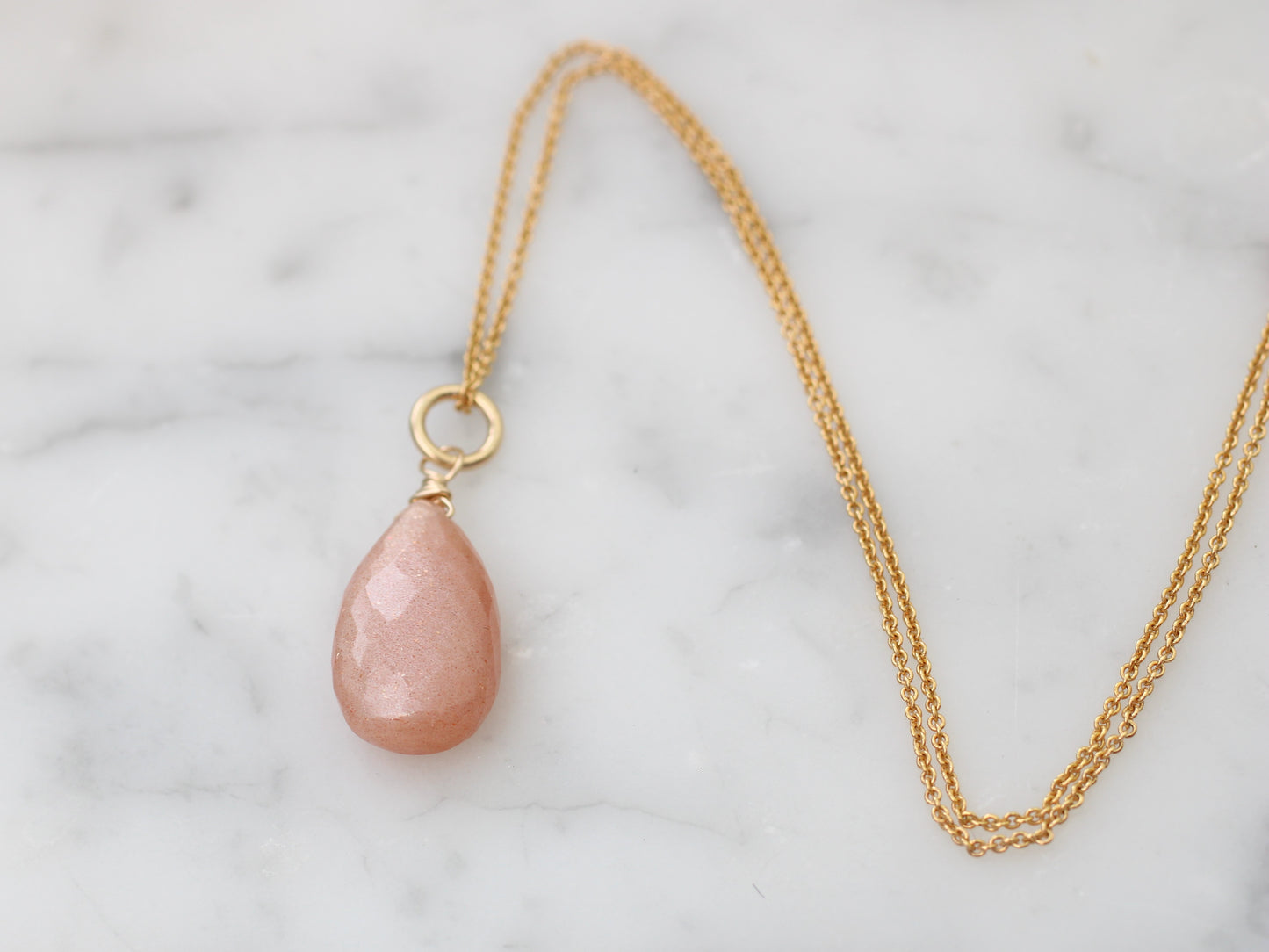 Peach moonstone necklace.