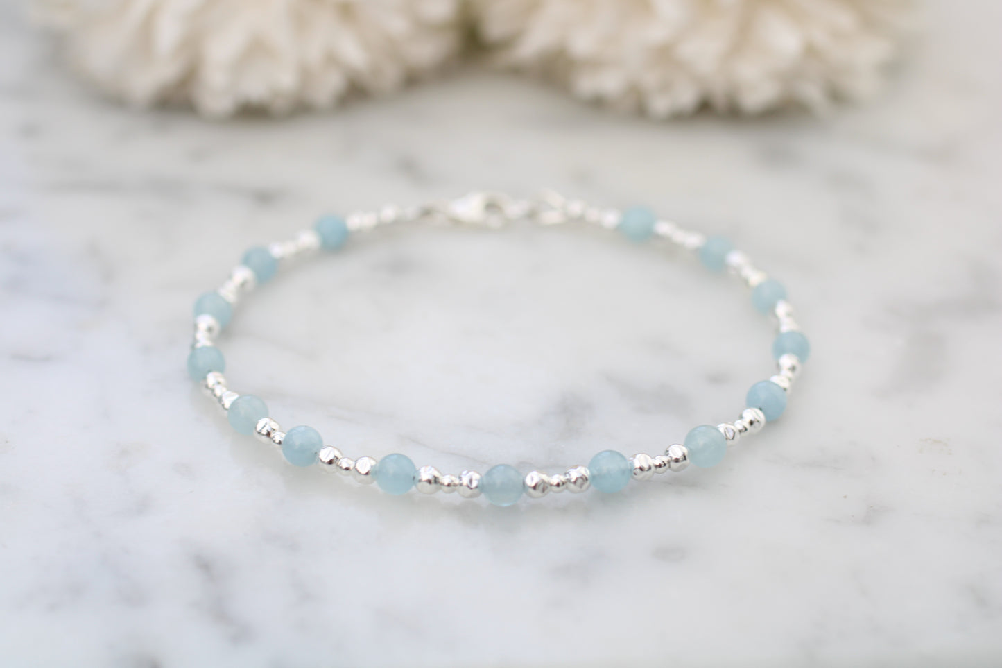 Personalised aquamarine bracelet in silver.