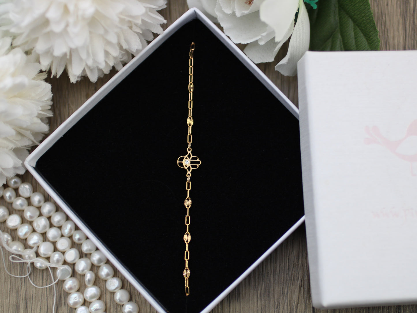 Hamsa hand bracelet.