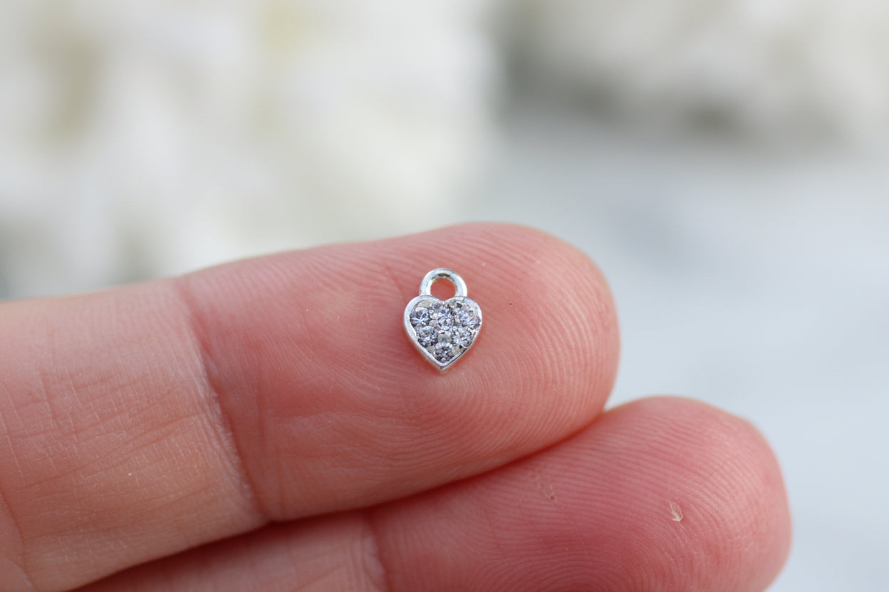 White crystal heart charm.