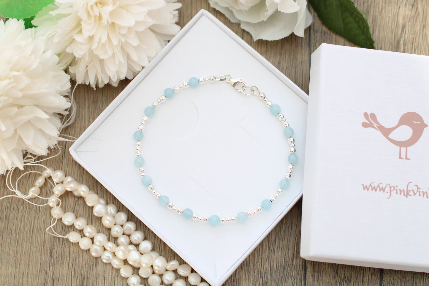 Personalised aquamarine bracelet in silver.