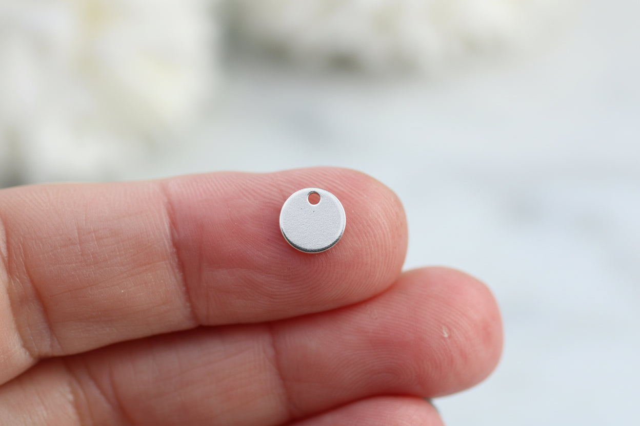 Personalised round charm.