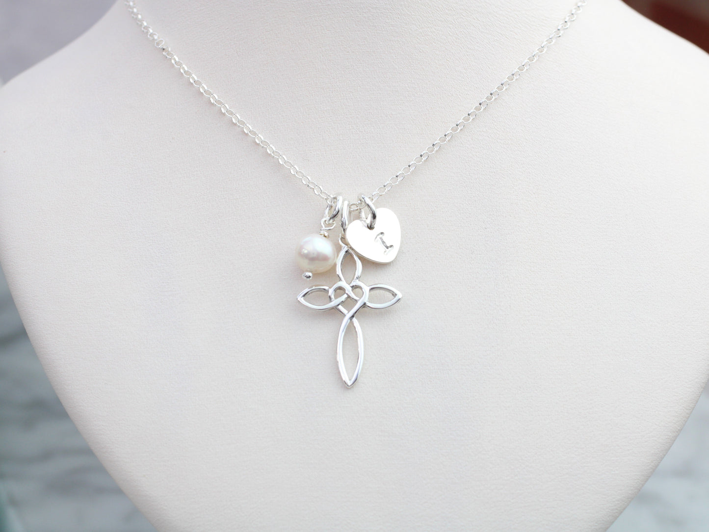 Personalised cross necklace with freshwater pearl.