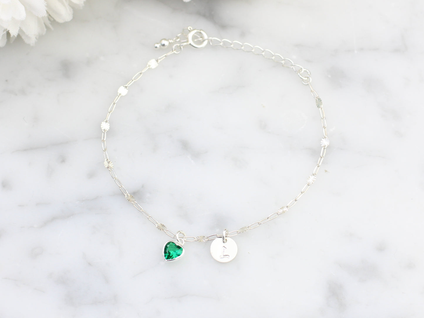 Personalised birthstone and initial adjustable bracelet.