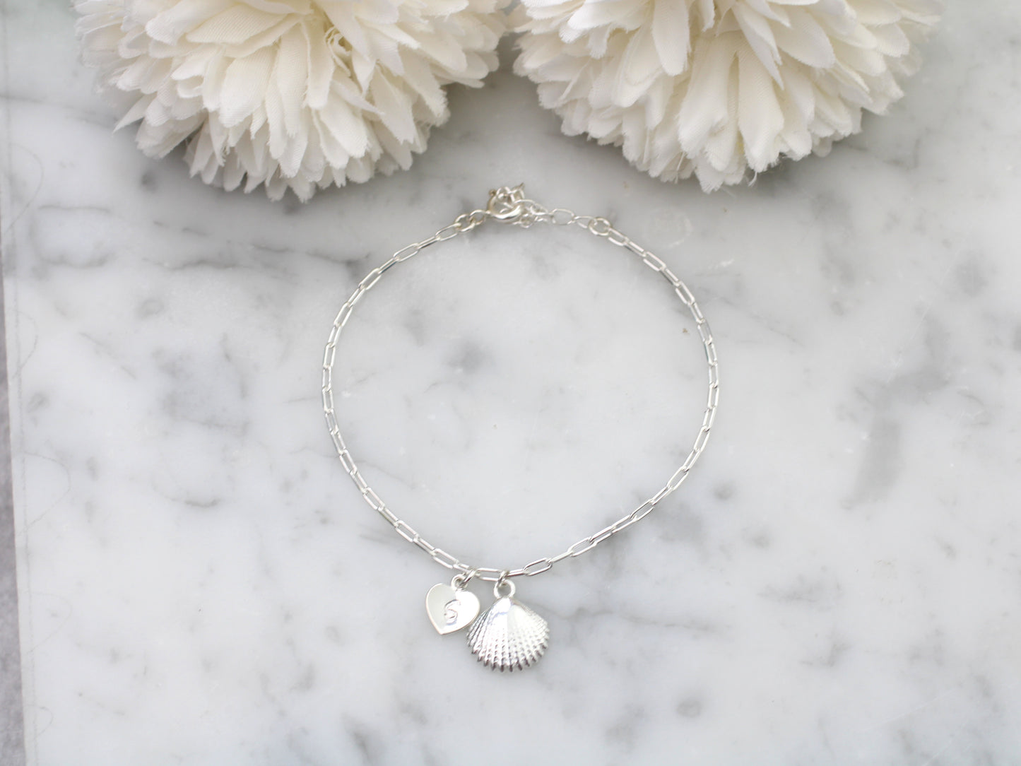 Personalised seashell bracelet in silver.