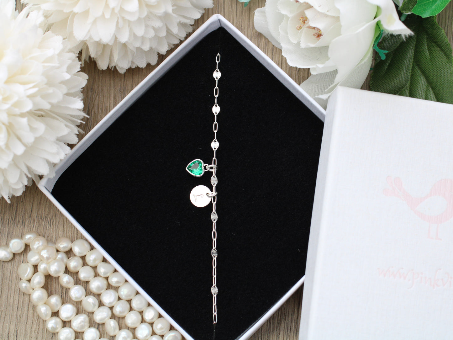 Personalised birthstone and initial adjustable bracelet.