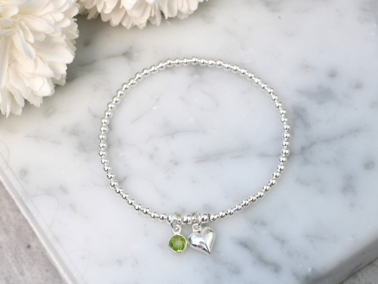 August birthstone charm bracelet.