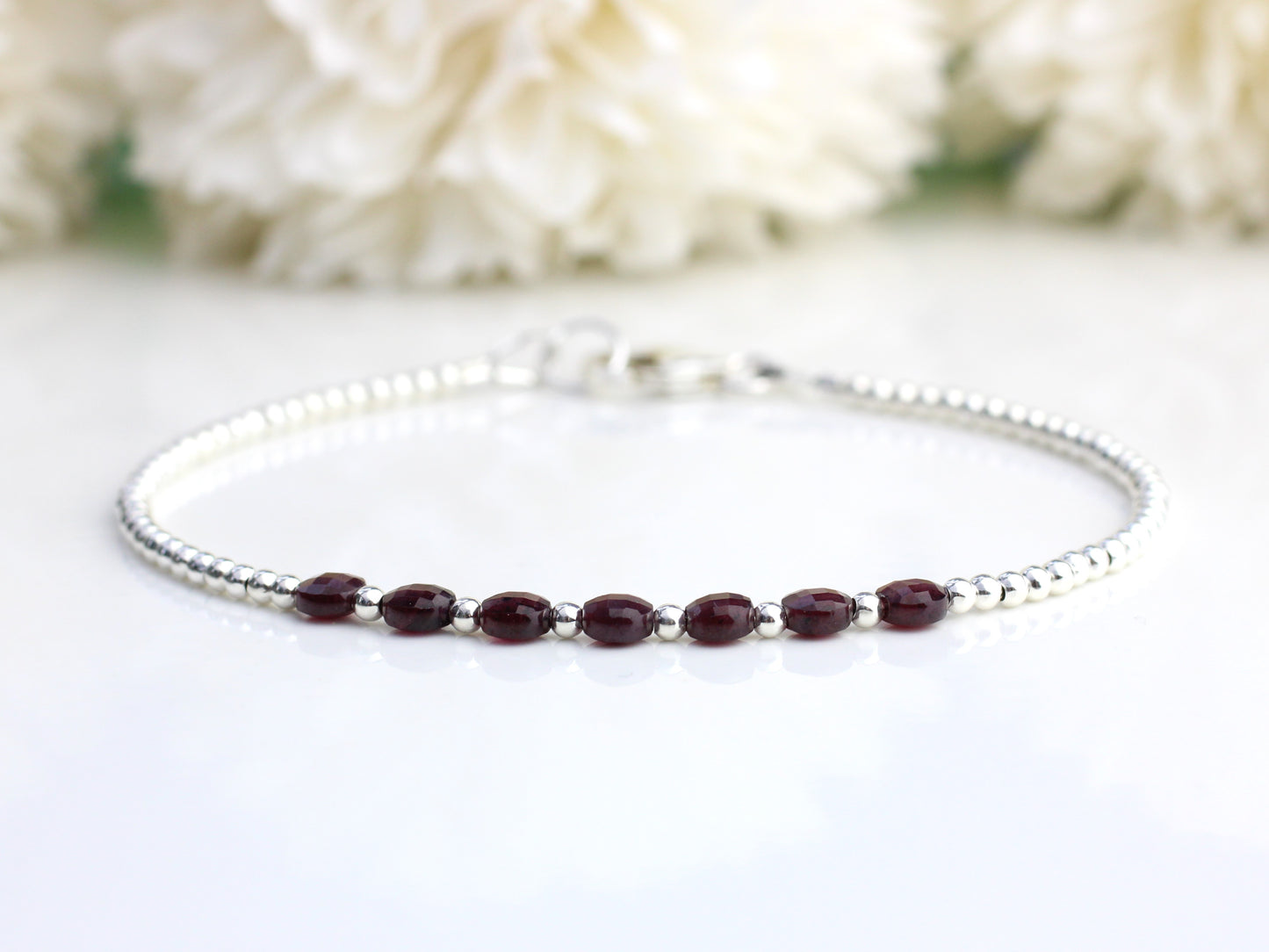 Garnet coin bead bracelet.