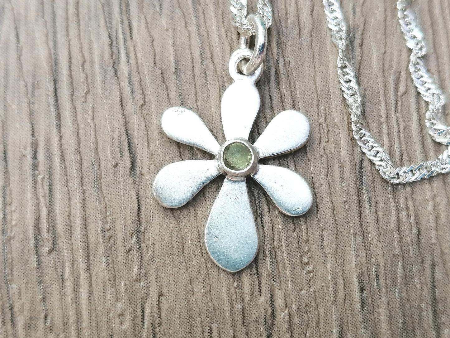 August birthstone necklace.