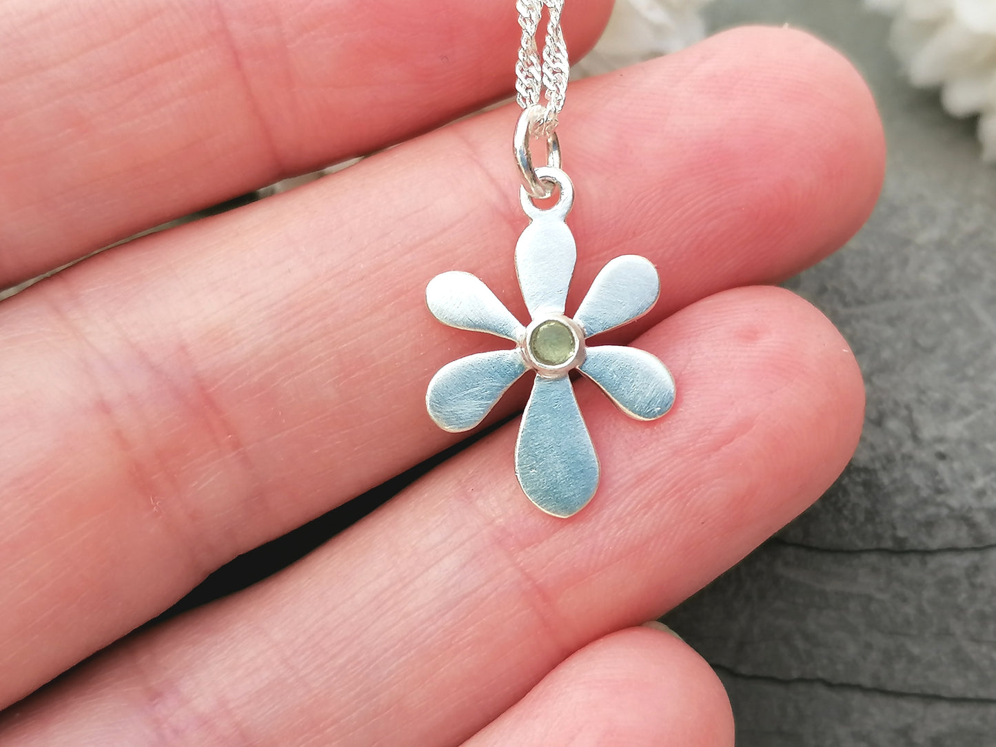 August birthstone necklace.