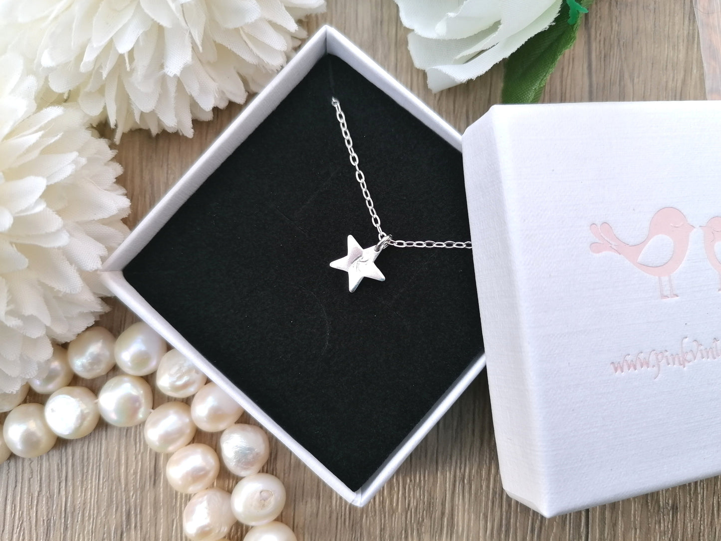 Star necklace in silver with optional birthstone charm.