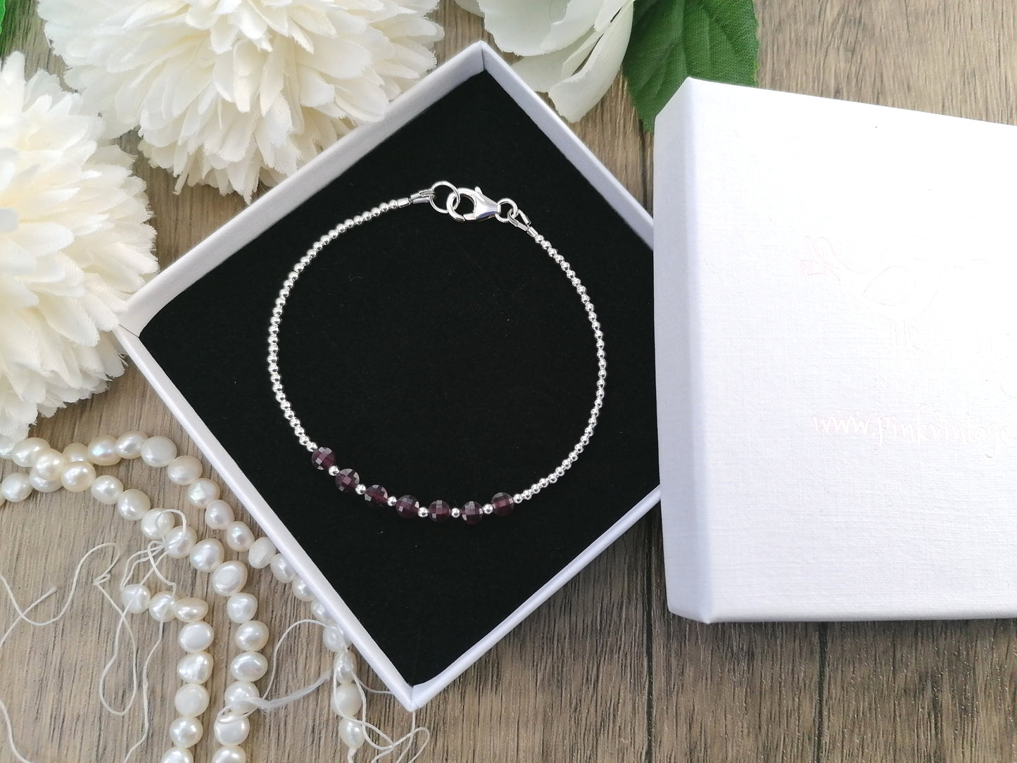 Garnet coin bead bracelet.