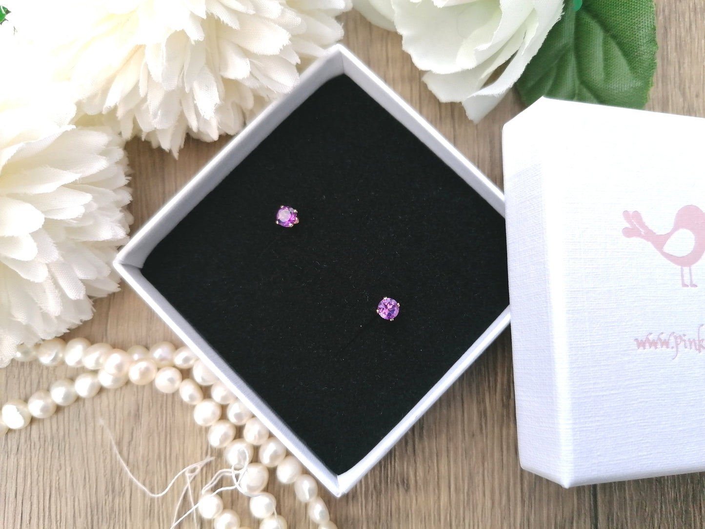 Amethyst stud earrings. February birthstone earrings.