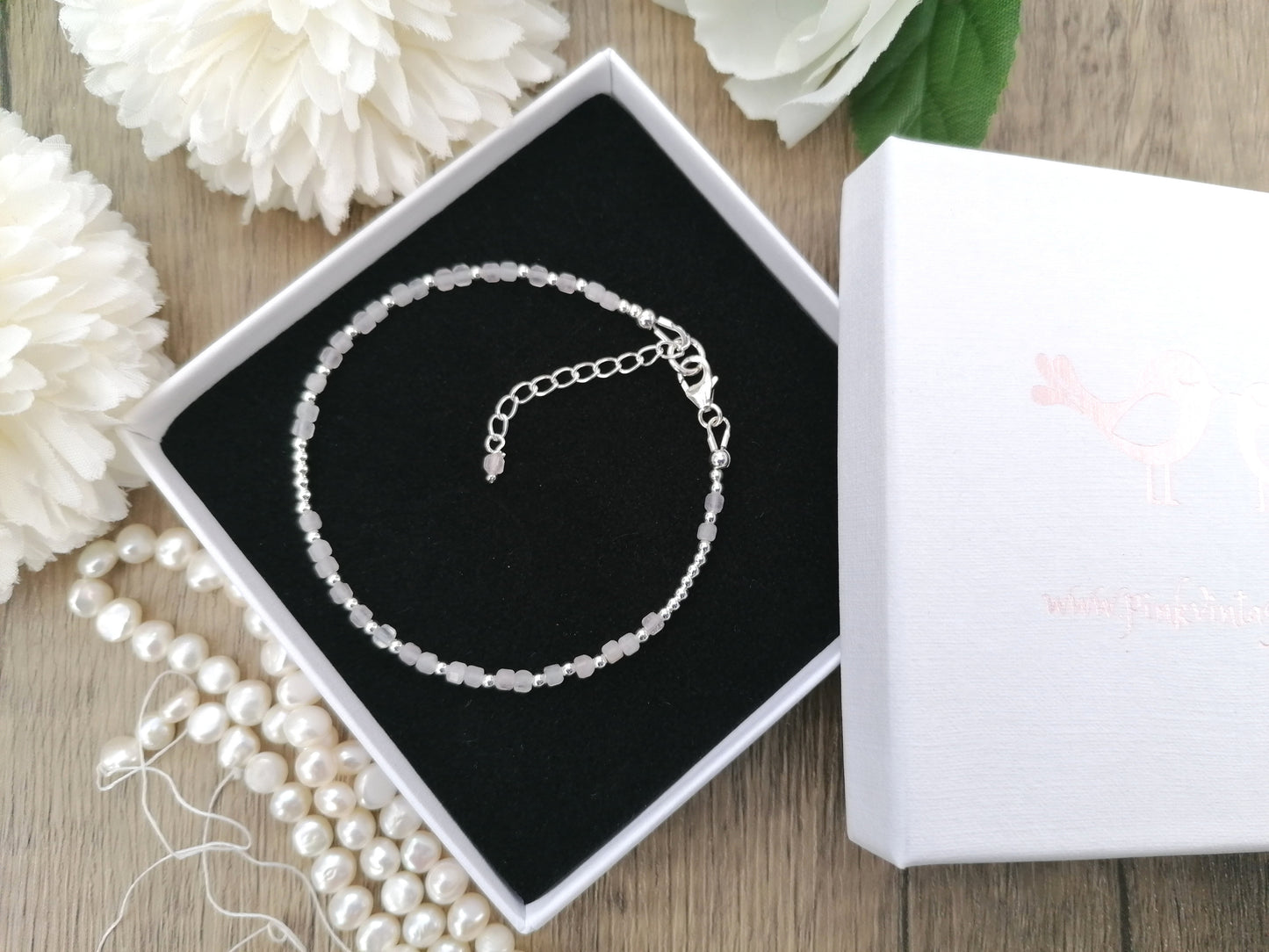 I love you Morse code bracelet made with rose quartz gemstones.